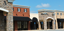 photo of several empty storefronts in a business mall