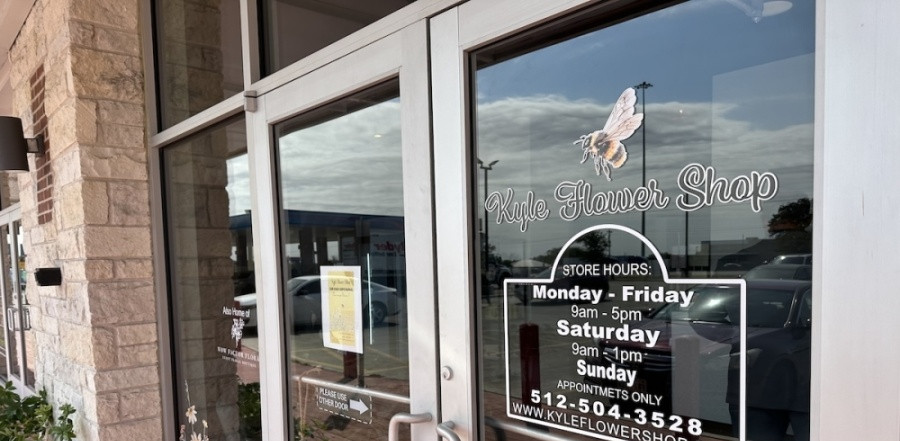 Picture of front glass doors of the new location of Kyle Flower Shop