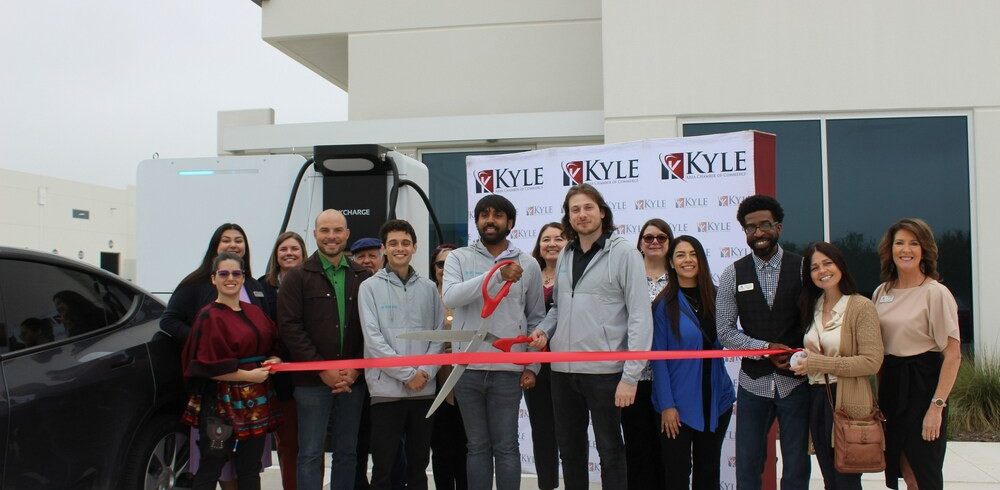 Officials with XCharge NA, the City of Kyle, and Kyle Area Chamber of Commerce officially open XCharge NA’s facility and unveil the Net Zero Series battery-integrated electric vehicle charger.