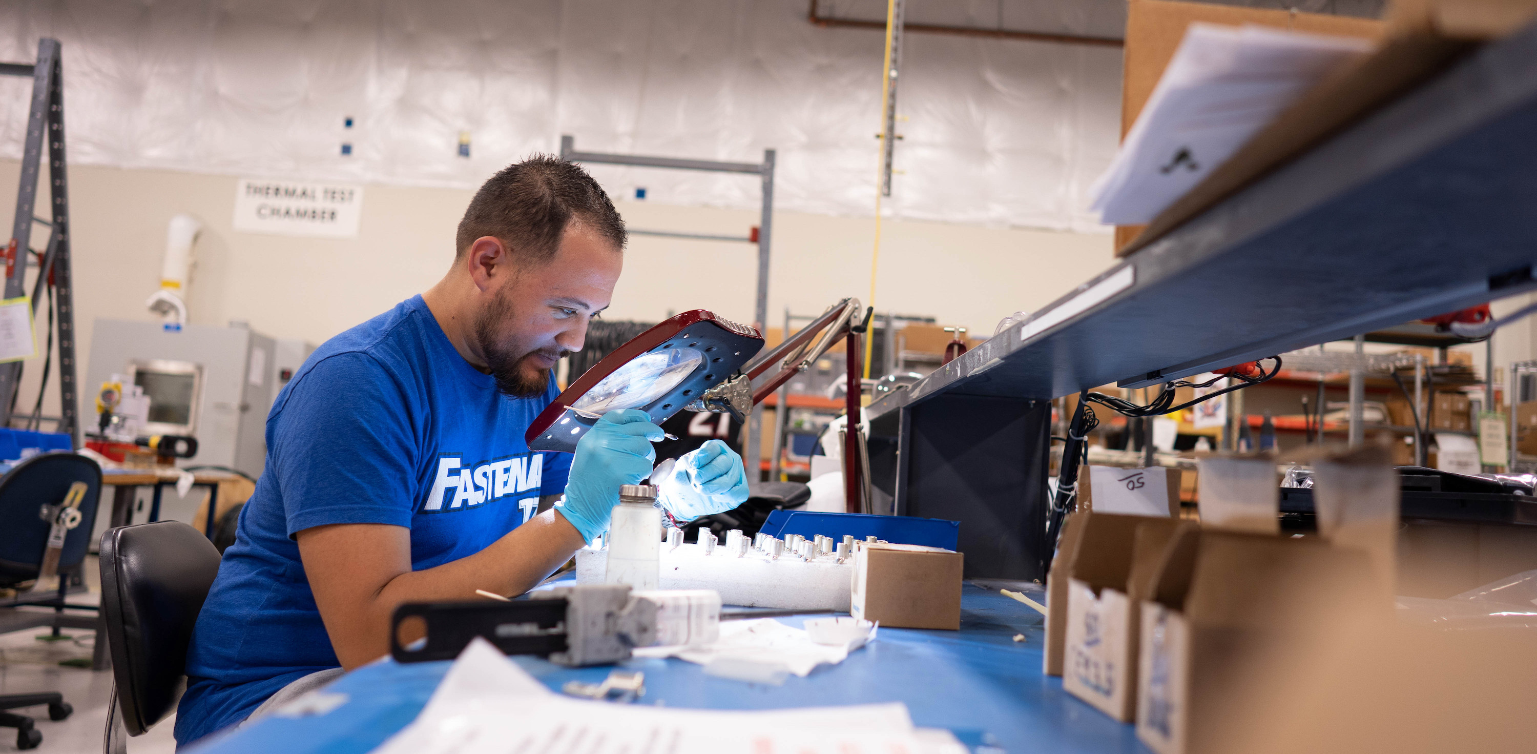 Fastenal employee precisely working on his product